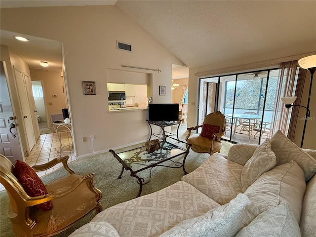 living room featuring light colored carpet and lofted ceiling