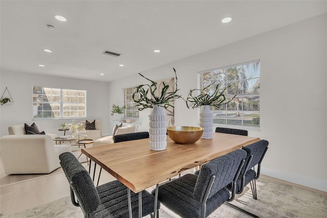 dining room with light hardwood / wood-style floors