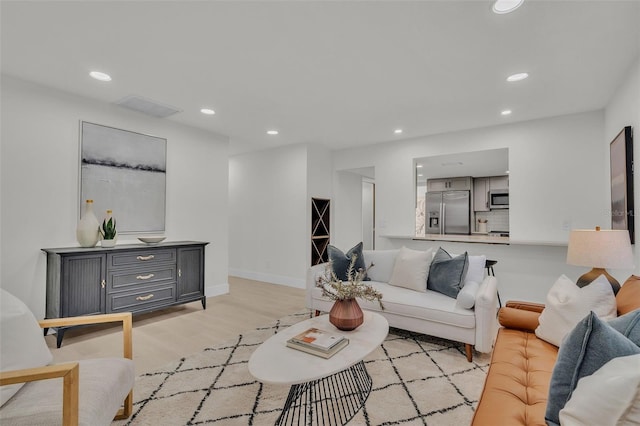 living room with light wood-type flooring