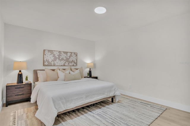 bedroom featuring light wood-type flooring