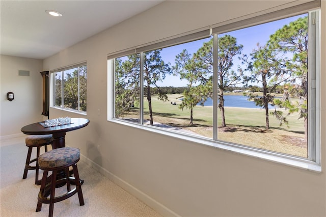 interior space with a water view