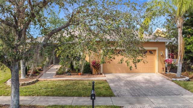 view of front of property with a garage