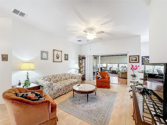 living room with ceiling fan