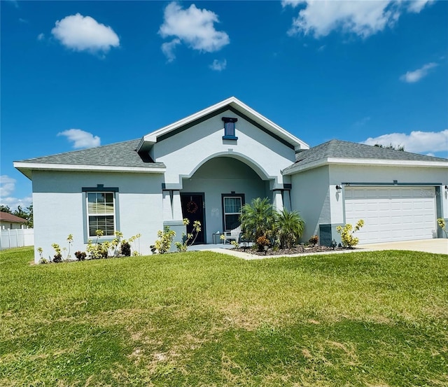 ranch-style house with a front lawn and a garage