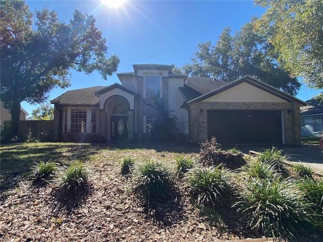 view of front of property with a garage