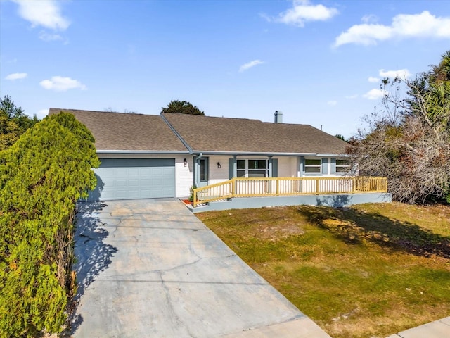 single story home with a front yard, a porch, and a garage