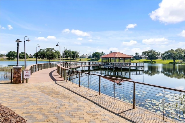 dock area featuring a gazebo and a water view