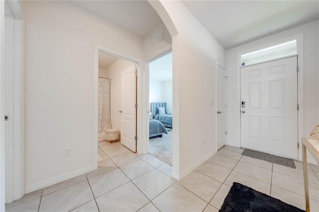 foyer with light tile patterned floors