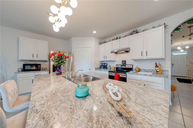 kitchen with white cabinetry, stainless steel electric range oven, sink, and a chandelier