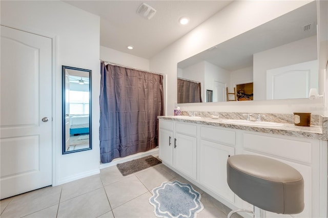 bathroom featuring vanity and tile patterned floors