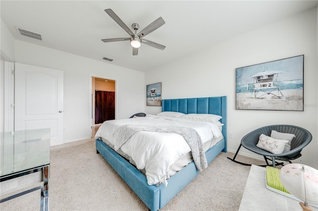 bedroom featuring ceiling fan and light colored carpet