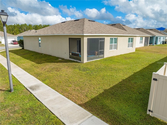 exterior space with a lawn