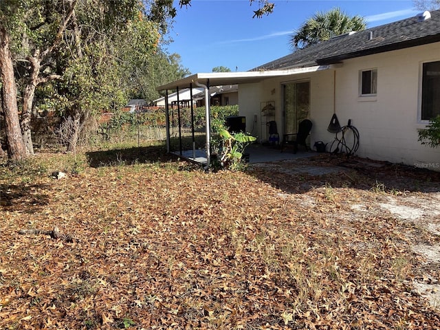 view of yard with a patio and fence