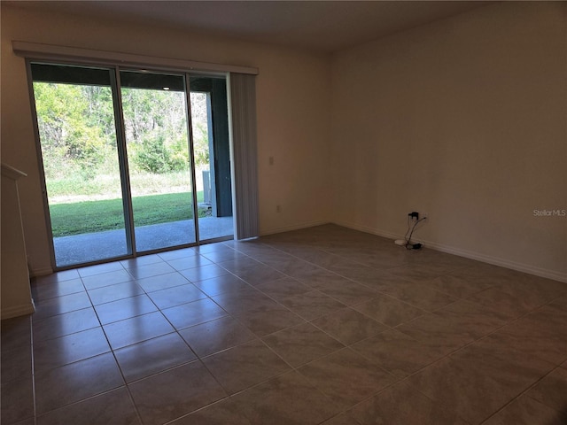 view of tiled spare room