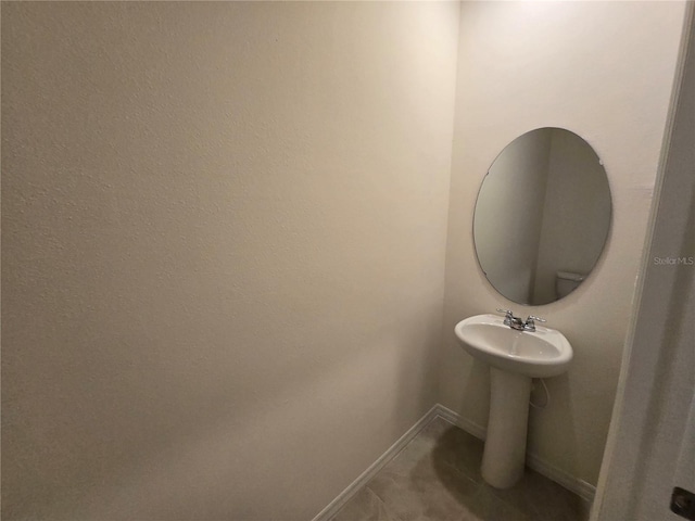 bathroom featuring tile patterned flooring