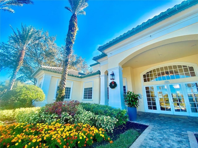 view of exterior entry with french doors