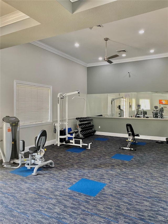 workout room with ornamental molding