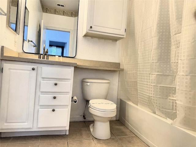 full bathroom with shower / bath combo, vanity, toilet, and tile patterned floors