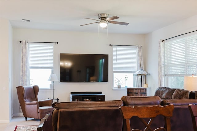 living room featuring ceiling fan