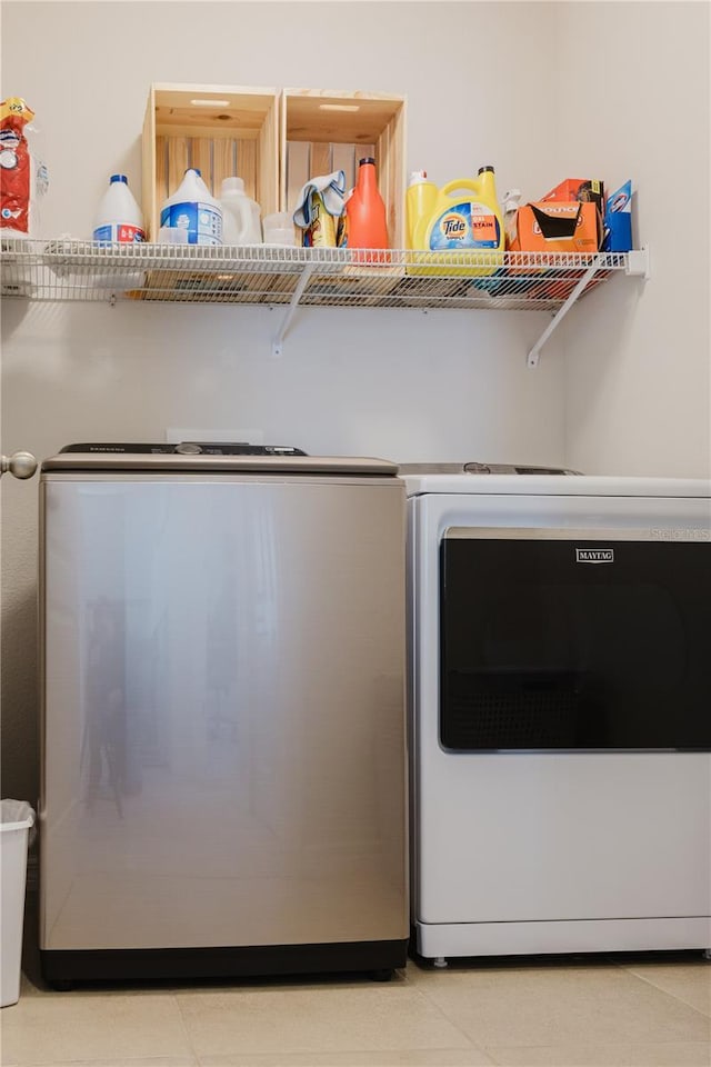 washroom featuring independent washer and dryer