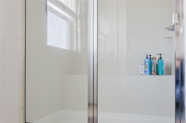 bathroom featuring an enclosed shower