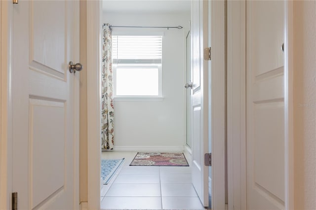 interior space featuring light tile patterned floors