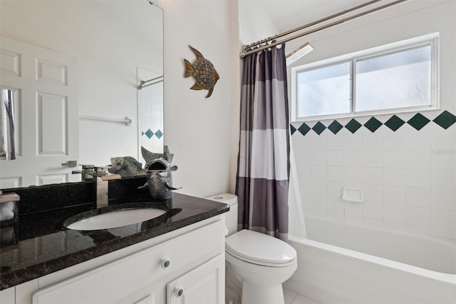 full bathroom featuring vanity, shower / tub combo, and toilet