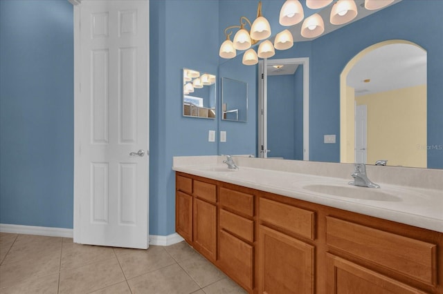 bathroom featuring tile patterned flooring and vanity