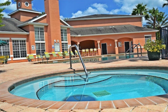 view of pool featuring a patio