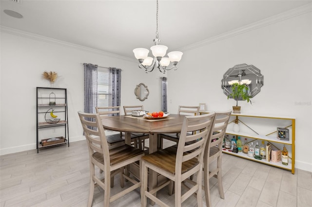 dining area featuring a notable chandelier, crown molding, and light wood-type flooring