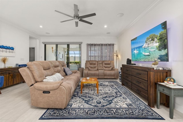 living room featuring crown molding and ceiling fan