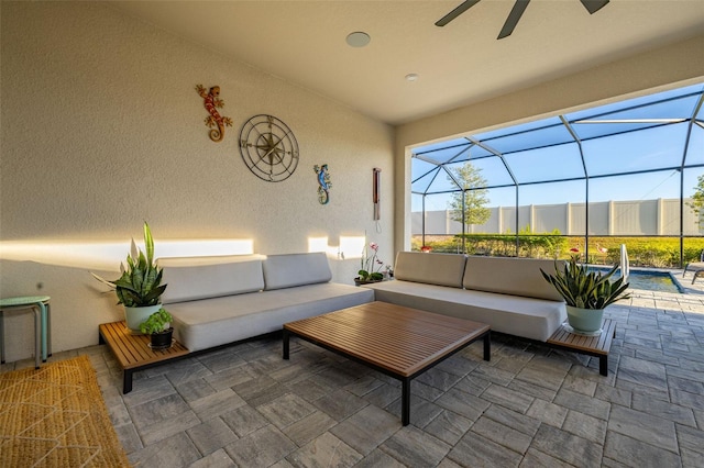 view of patio / terrace featuring outdoor lounge area and a lanai