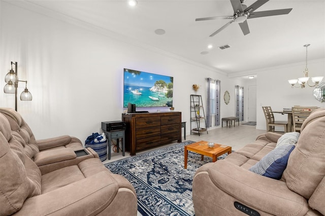 living room with ceiling fan with notable chandelier and ornamental molding