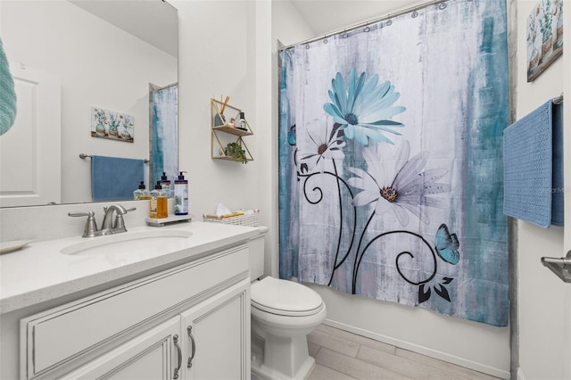 full bathroom with vanity, toilet, and shower / bath combo