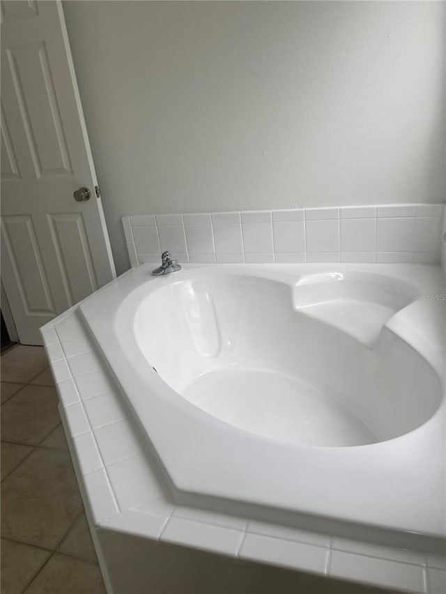 bathroom with tile patterned floors