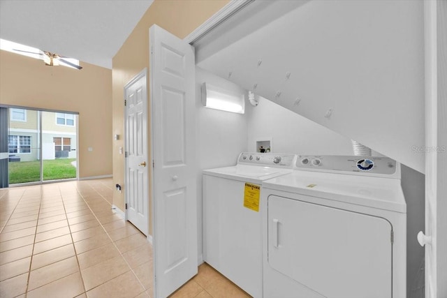 washroom featuring light tile patterned flooring and separate washer and dryer