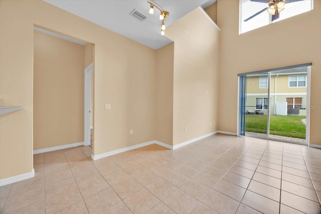 empty room featuring light tile patterned floors