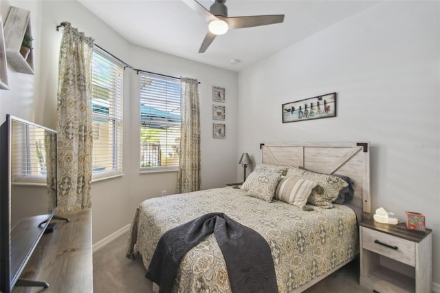 bedroom featuring ceiling fan and carpet flooring