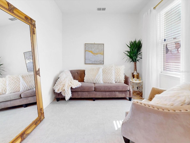 living room featuring light tile patterned flooring