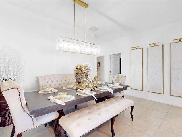 tiled dining area featuring breakfast area