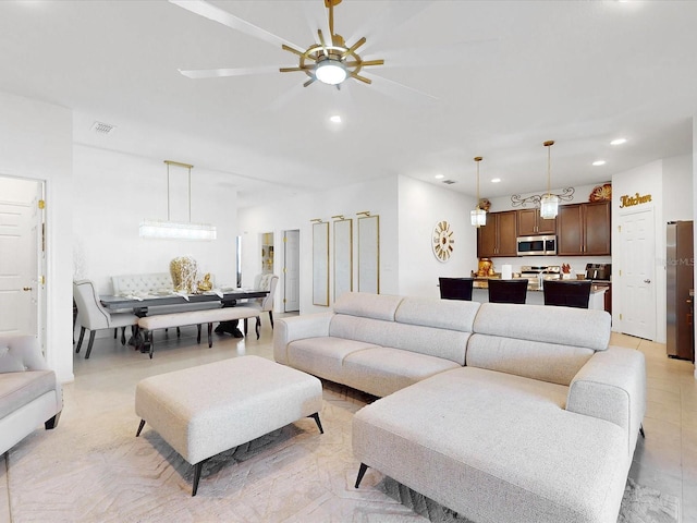 living room with ceiling fan