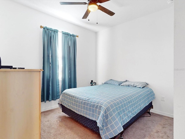 bedroom featuring carpet flooring and ceiling fan