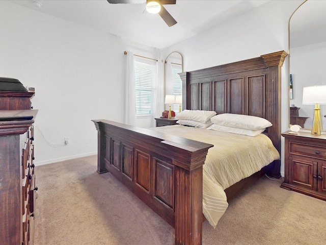 bedroom with light colored carpet and ceiling fan