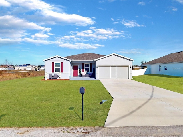 ranch-style house with a front yard and a garage