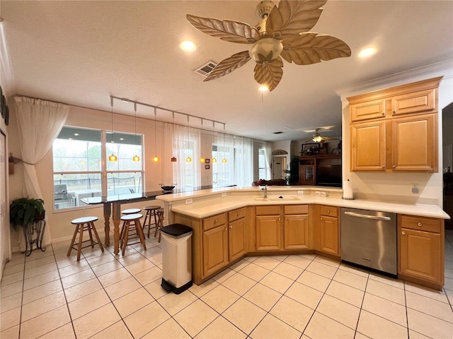 kitchen with ceiling fan, kitchen peninsula, dishwasher, and light tile patterned flooring