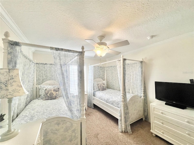 carpeted bedroom featuring crown molding, a textured ceiling, and ceiling fan