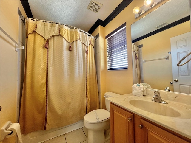 bathroom featuring toilet, vanity, walk in shower, crown molding, and tile patterned floors