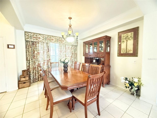 8557 La Isla Dr, Kissimmee, FL 34747 - dining space featuring a chandelier, ornamental molding, light tile patterned floors, and baseboards