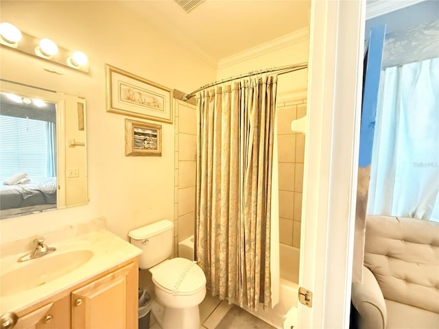 8557 La Isla Dr, Kissimmee, FL 34747 - ensuite bathroom with ornamental molding, vanity, shower / bath combo, toilet, and tile patterned flooring