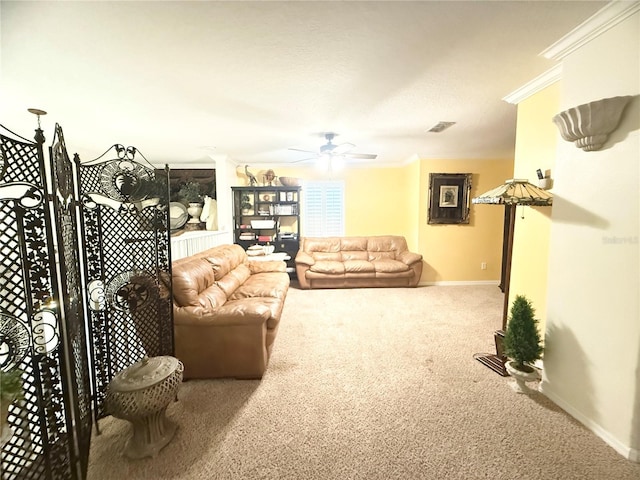 8557 La Isla Dr, Kissimmee, FL 34747 - living area featuring carpet, ornamental molding, ceiling fan, and baseboards